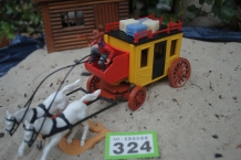 images/productimages/small/wells-fargo-stagecoach-with-coachman-2nd-version-timpo-toys-g.324-a.jpg