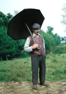 F.073  CIVILIAN WITH AN OPEN UMBRELLA