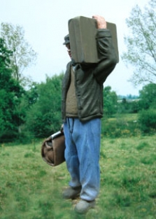 F.095  CIVILIAN WITH A BAG ON HIS SHOULDER